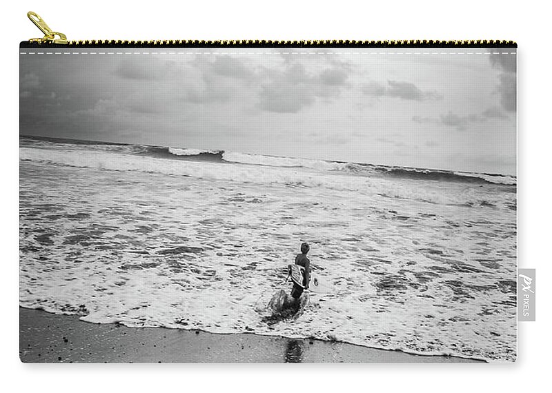 Surfer.surfing Zip Pouch featuring the photograph Young Surfer by Tito Slack