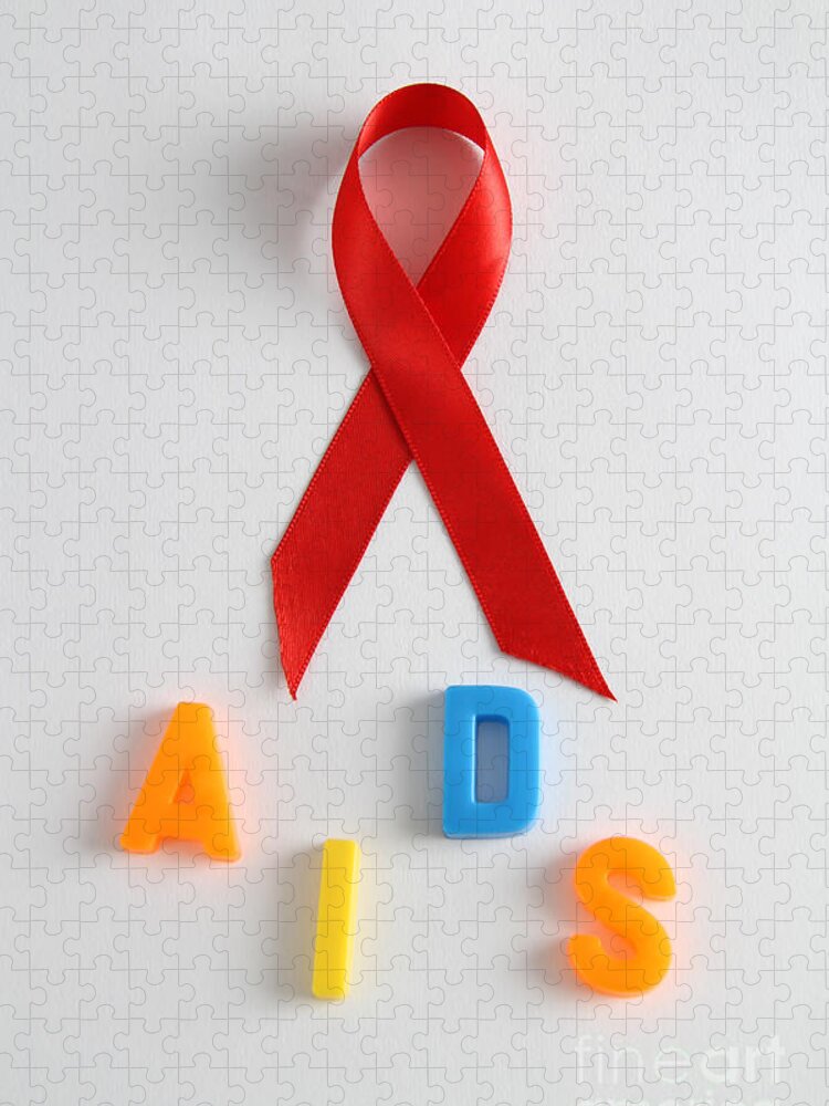 Acquired Immune Deficiency Jigsaw Puzzle featuring the photograph Aids Awareness Symbol #1 by Photo Researchers, Inc.