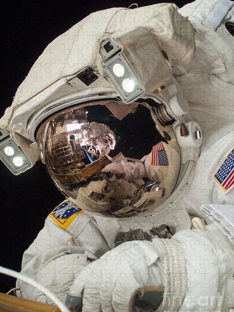 Space Jigsaw Puzzle featuring the photograph Iss Expedition 38 Spacewalk #1 by Science Source