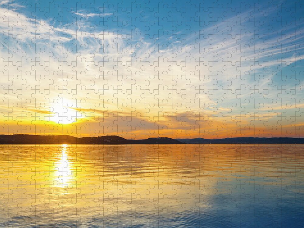 Scenics Jigsaw Puzzle featuring the photograph Sunset Over Water #2 by Focusstock
