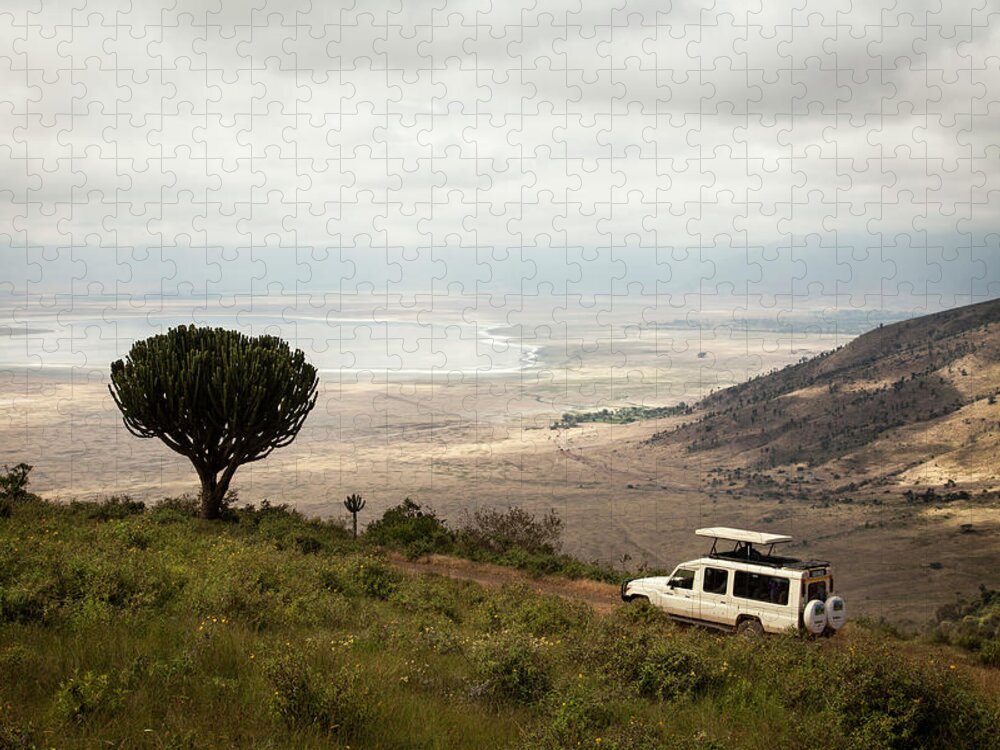 Tranquility Jigsaw Puzzle featuring the photograph A Safari Truck Descends Into The by Tegra Stone Nuess