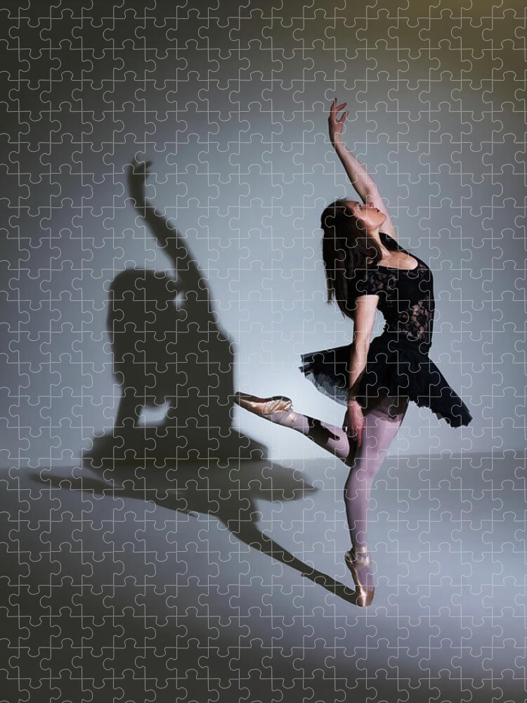 Expertise Jigsaw Puzzle featuring the photograph Ballet Dancer Performing In Spotlight by Phil Payne Photography