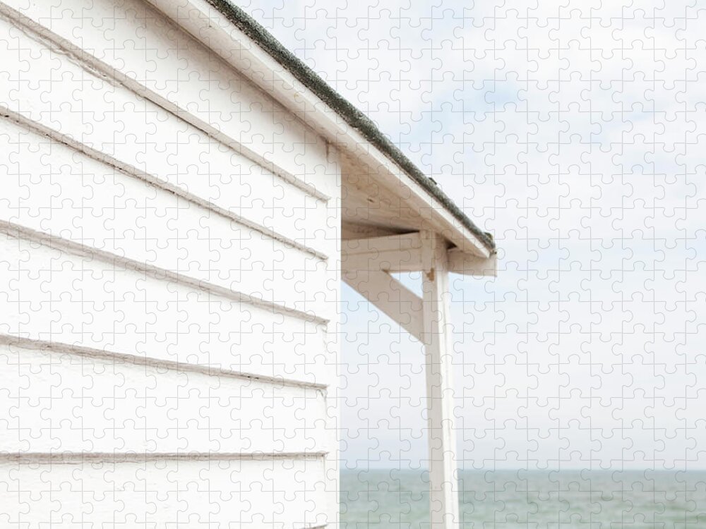 Beach Hut Jigsaw Puzzle featuring the photograph Beach Hut And The Sea by James French
