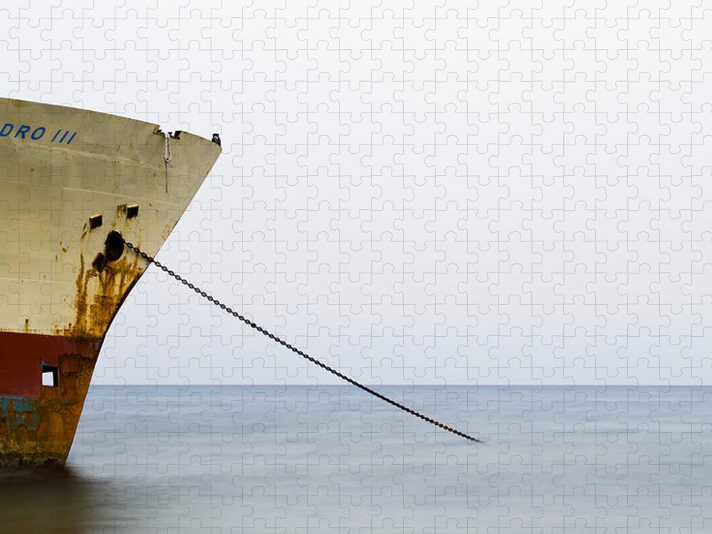 Seascape Jigsaw Puzzle featuring the photograph Abandoned ship on the ocean by Michalakis Ppalis