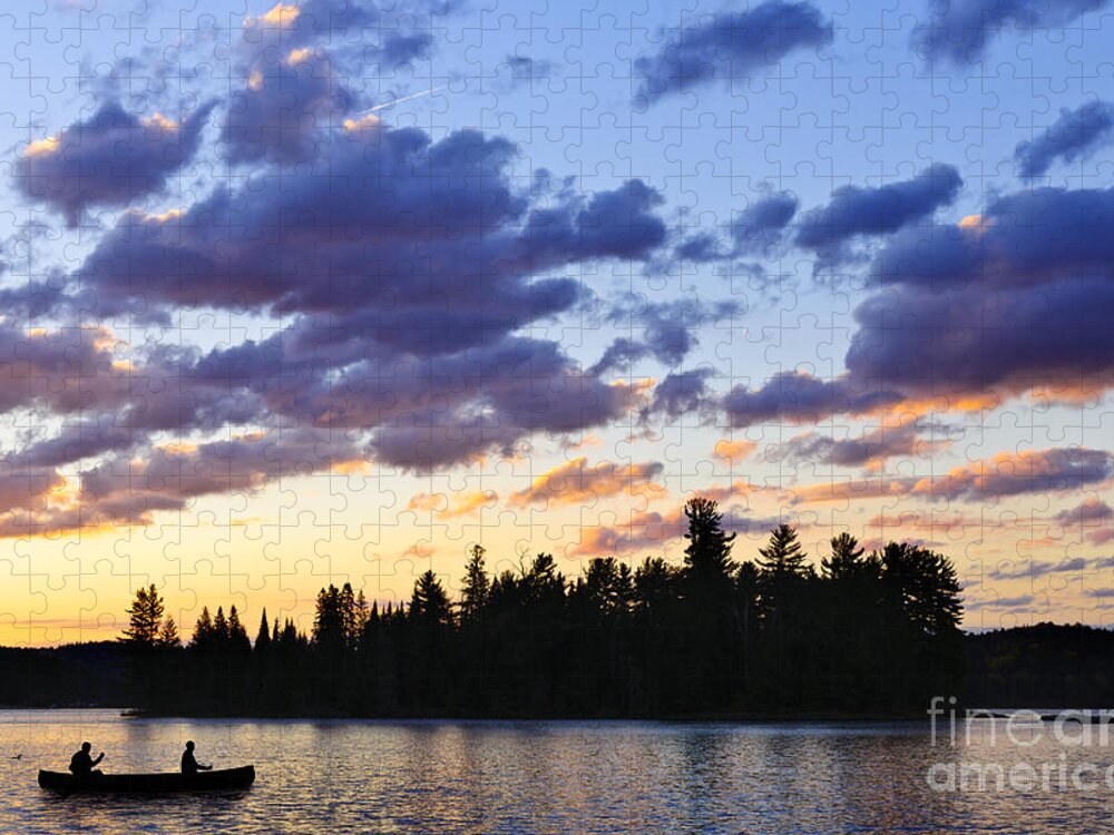 Sunset Jigsaw Puzzle featuring the photograph Canoeing at sunset by Elena Elisseeva