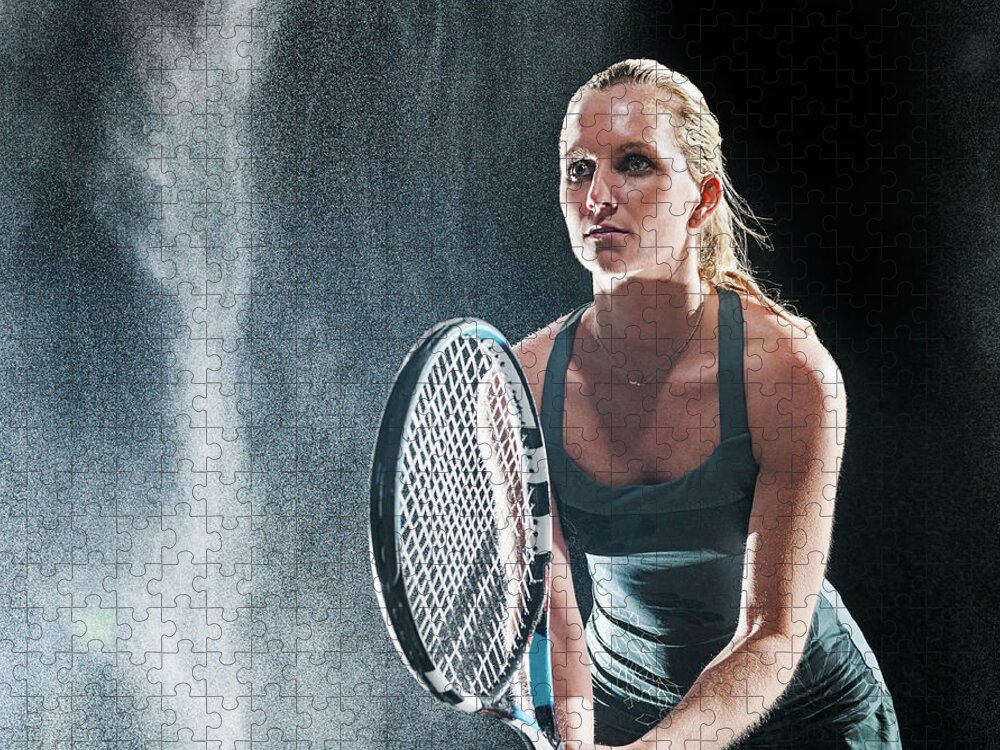Tennis Jigsaw Puzzle featuring the photograph Caucasian Tennis Player Standing In Rain by Erik Isakson