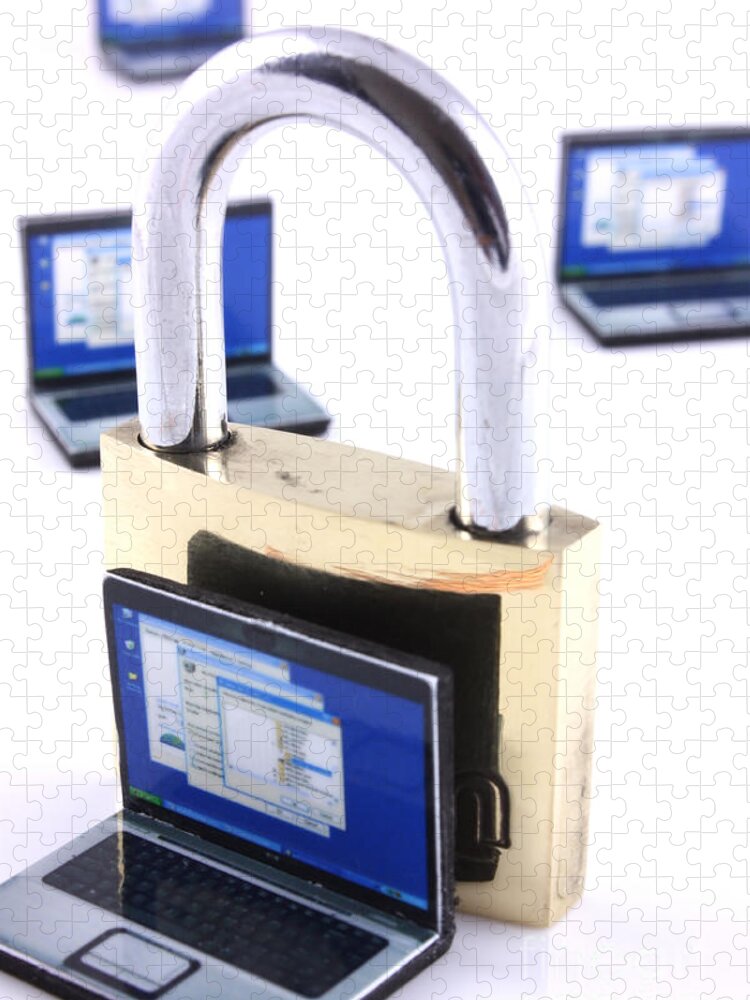 Unlocked Jigsaw Puzzle featuring the photograph Computer security concept by Simon Bratt