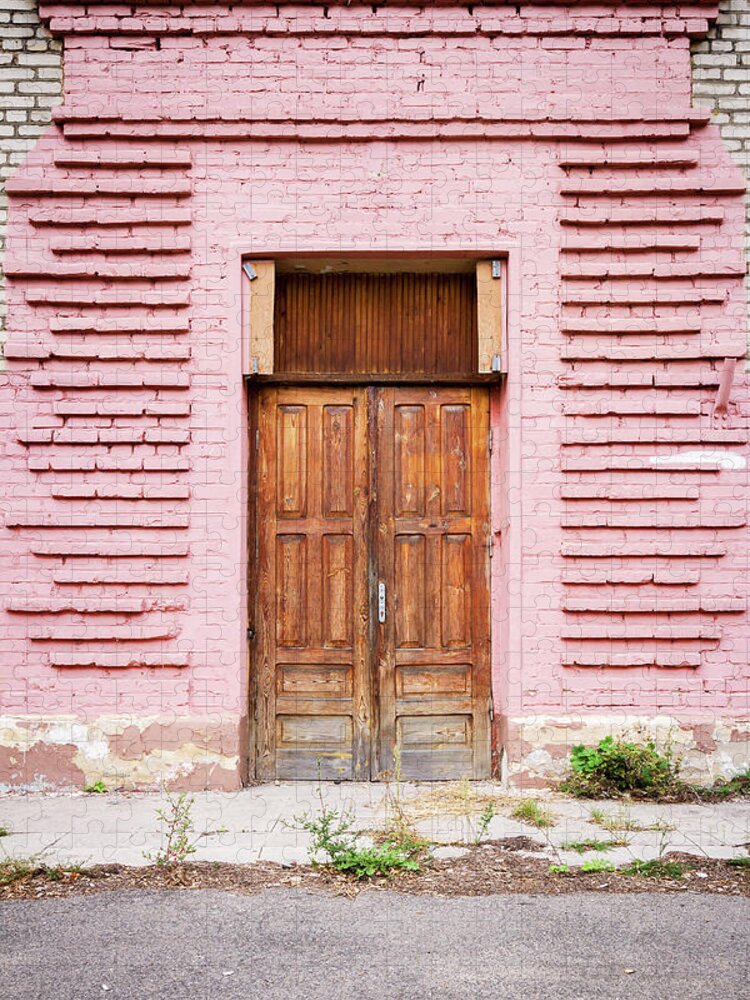 Orange Color Jigsaw Puzzle featuring the photograph Door In A Pink Wall by Wylius