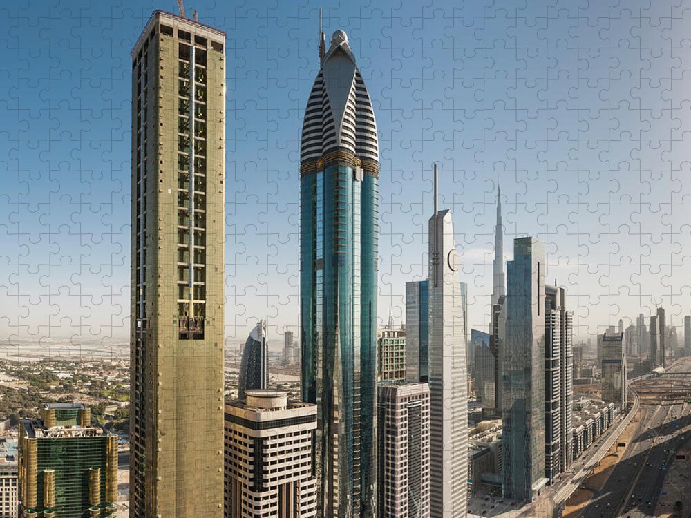 Arabia Jigsaw Puzzle featuring the photograph Dubai Futuristic Skyscrapers Of Sheikh by Fotovoyager