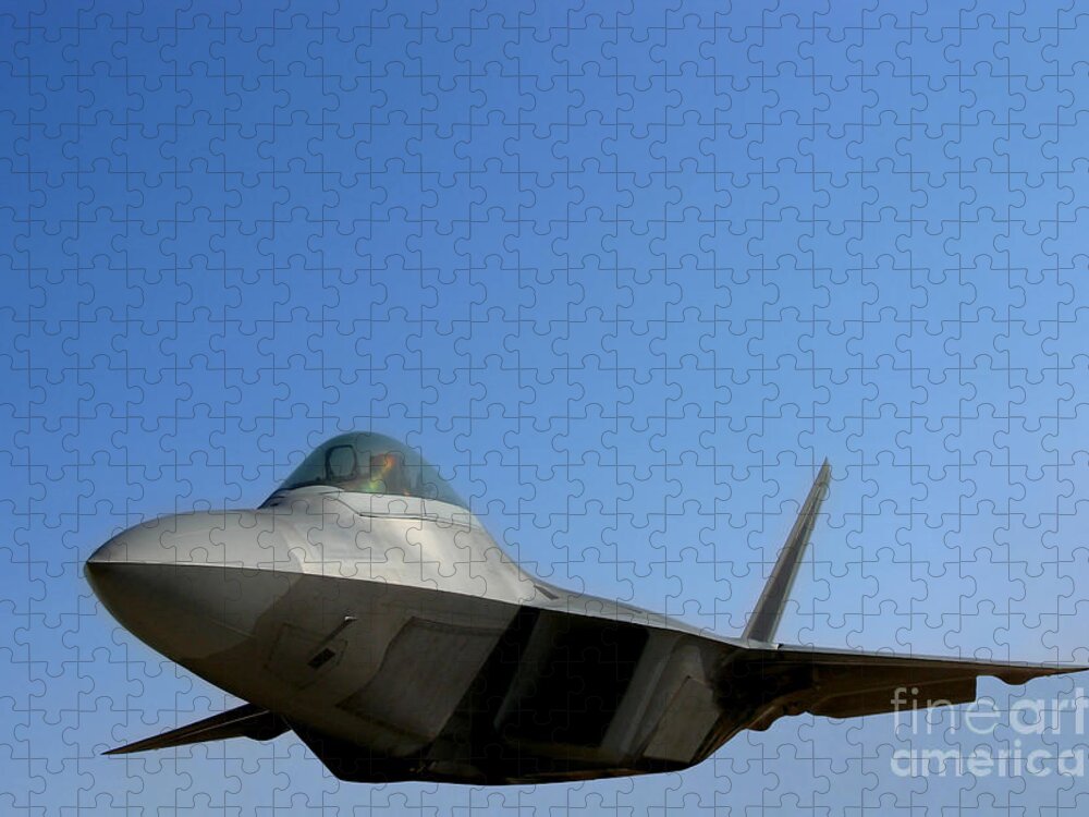 F22 Jigsaw Puzzle featuring the photograph F22 Raptor by Olivier Le Queinec