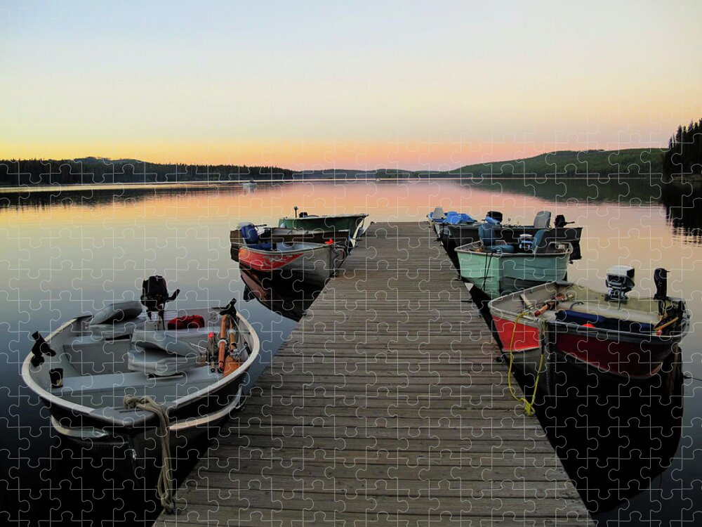 Water's Edge Jigsaw Puzzle featuring the photograph Fishing Boats Line Dock At Sunset by Wildroze