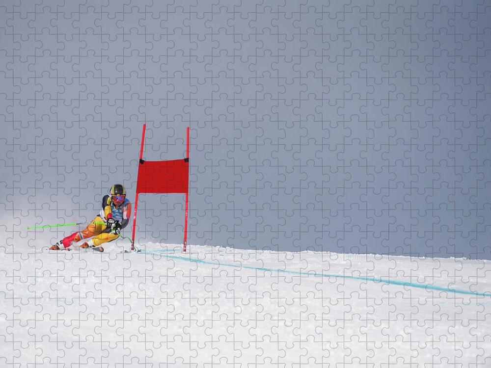 Skiing Jigsaw Puzzle featuring the photograph Giant Slalom Skier Rounds Gate At High by Ascent Xmedia