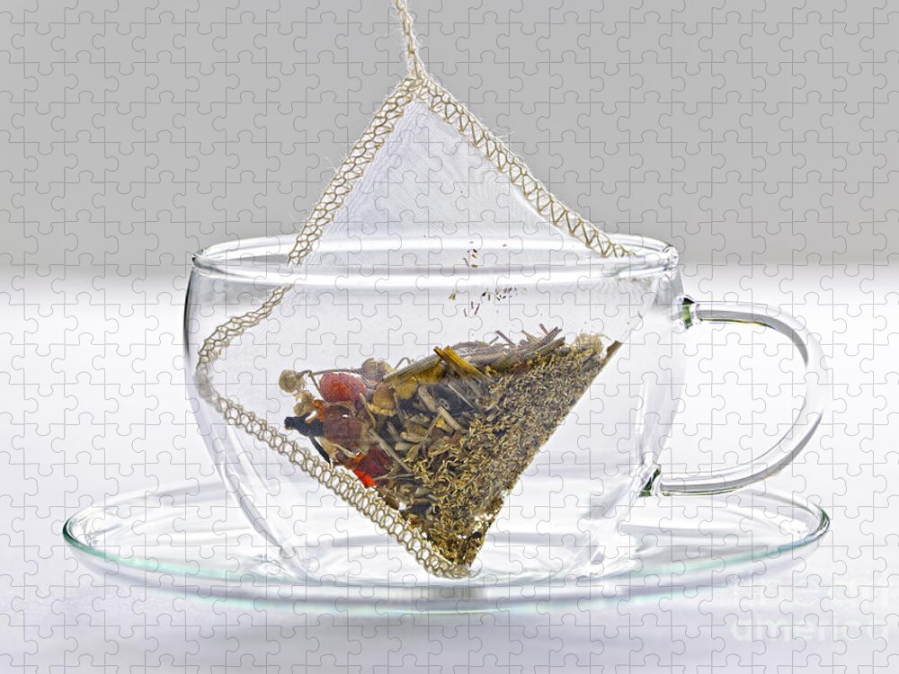 Tea Jigsaw Puzzle featuring the photograph Herbal tea bag in cup by Elena Elisseeva