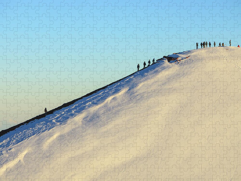 People Jigsaw Puzzle featuring the photograph Hikers Climbing Snowy Mountain by Cultura Rm Exclusive/stuart Westmorland