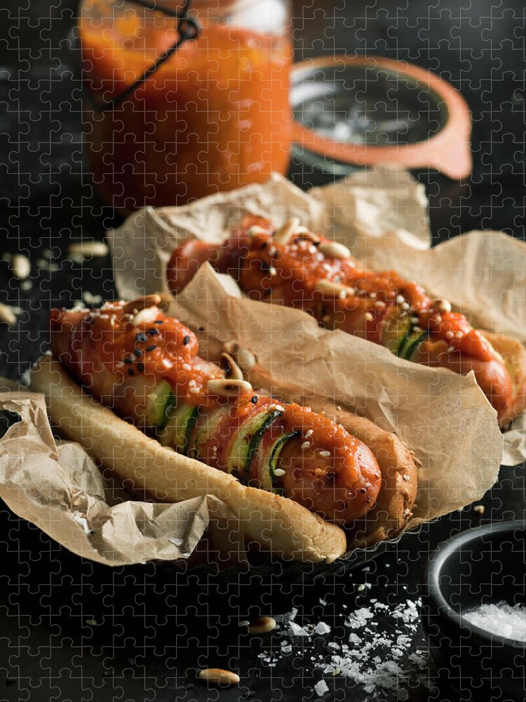Unhealthy Eating Jigsaw Puzzle featuring the photograph Hot Dogs by Johner Images