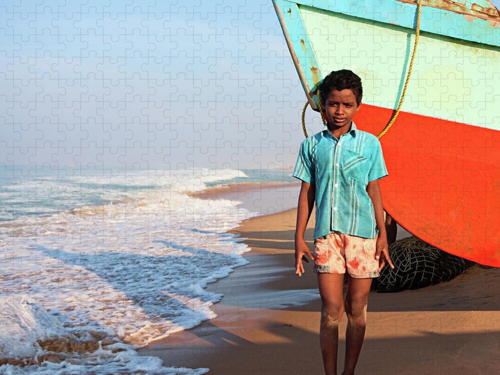 Water's Edge Jigsaw Puzzle featuring the photograph Indian Boy On The Beach by Hadynyah