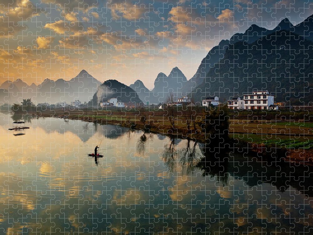 Yangshuo Jigsaw Puzzle featuring the photograph Karst Mountains And Fisherman On Raft by Richard I'anson