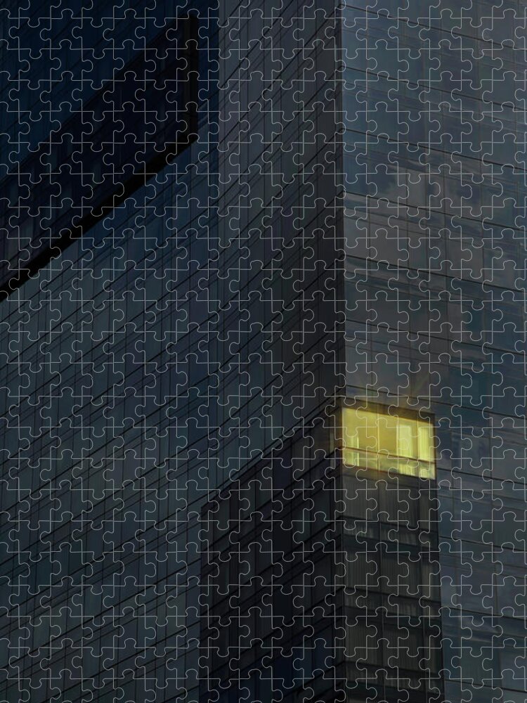Office Jigsaw Puzzle featuring the photograph Lit Office In A Dark Building by Buena Vista Images