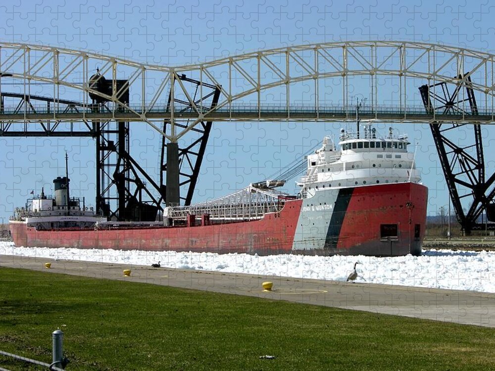 Great Lakes Jigsaw Puzzle featuring the photograph Moving through the ice to the Soo Locks by Keith Stokes
