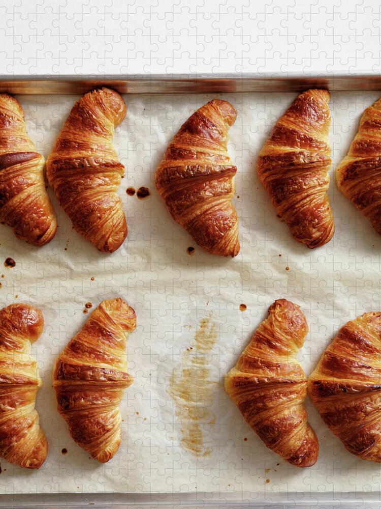 In A Row Jigsaw Puzzle featuring the photograph Overhead Of Croissants On Baking Pan by Maren Caruso