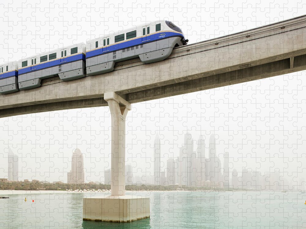 Standing Water Jigsaw Puzzle featuring the photograph Palm Jumeirah Monorail by Jorg Greuel
