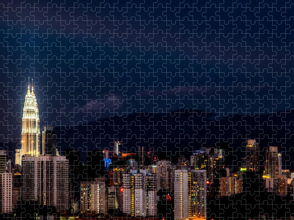 City Centre Jigsaw Puzzle featuring the photograph Petronas Lights by Adrian Evans