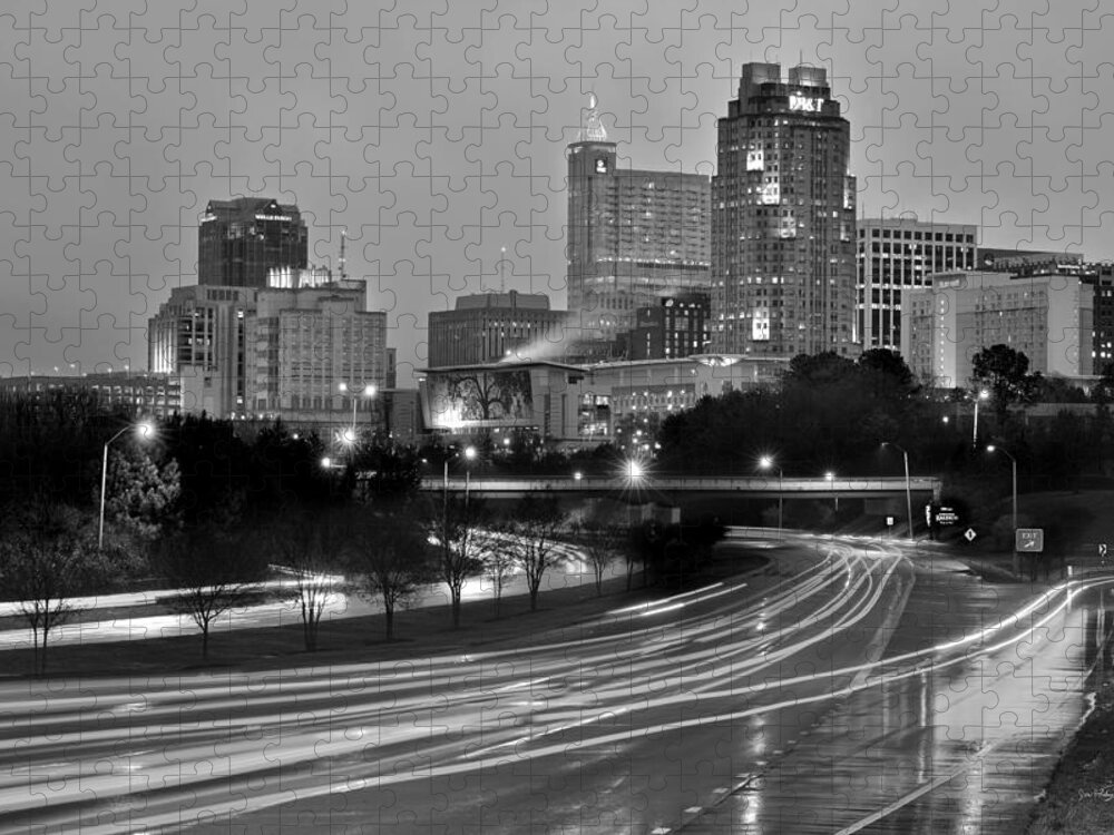 Raleigh Skyline Jigsaw Puzzle featuring the photograph Raleigh Skyline at Dusk Evening Black and White BW Evening Panorama North Carolina NC by Jon Holiday