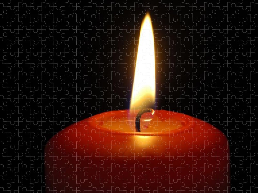 Candle Jigsaw Puzzle featuring the photograph Red candle burning by Matthias Hauser