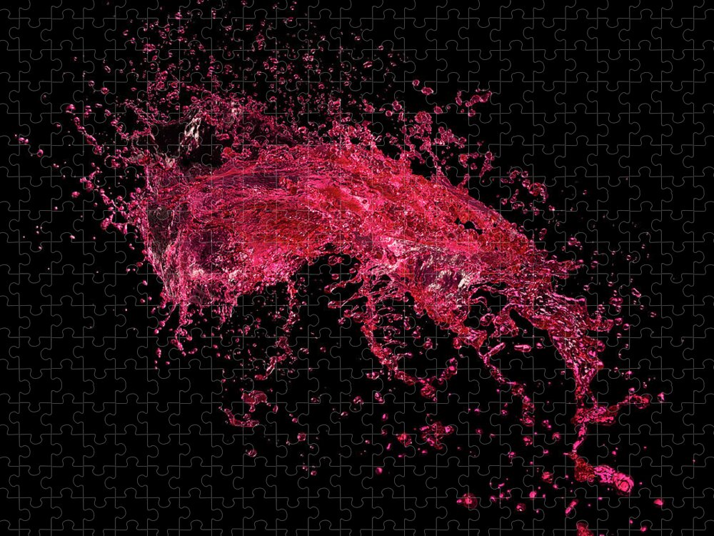 Black Background Jigsaw Puzzle featuring the photograph Red Water Splash On Black Background by Biwa Studio