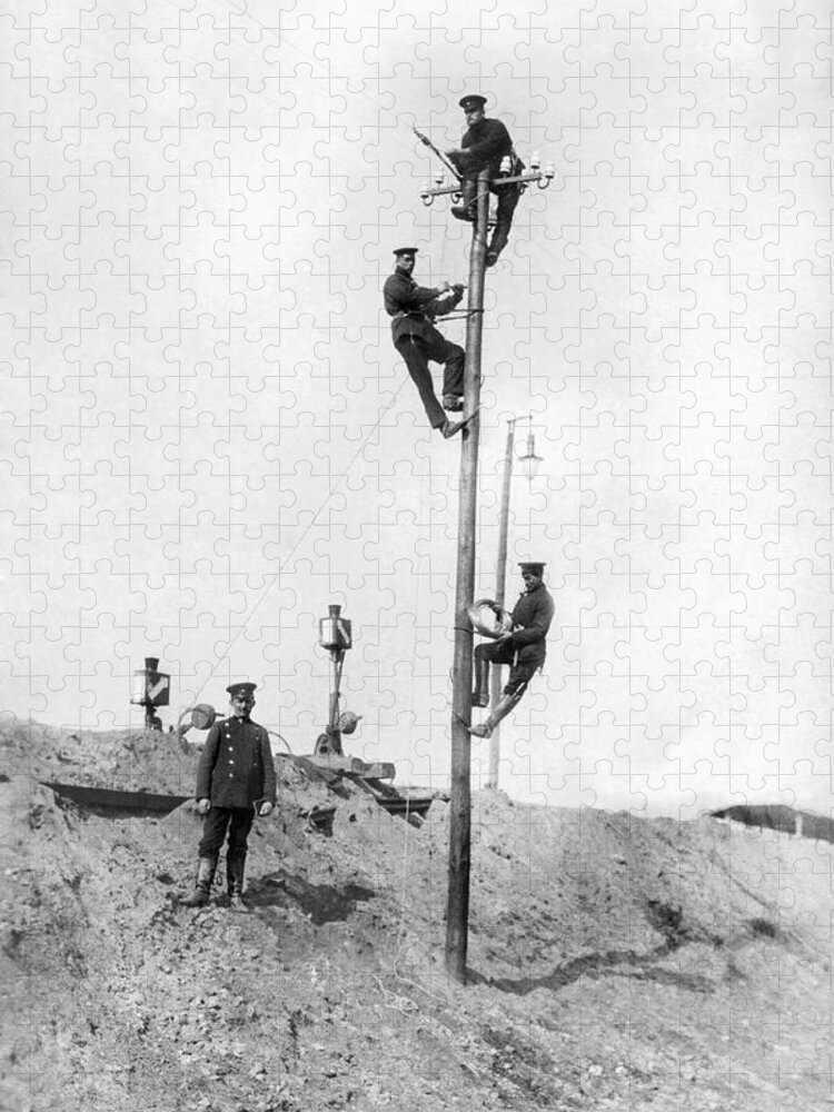 1910s Jigsaw Puzzle featuring the photograph Repairing Telegraph Lines by Underwood Archives