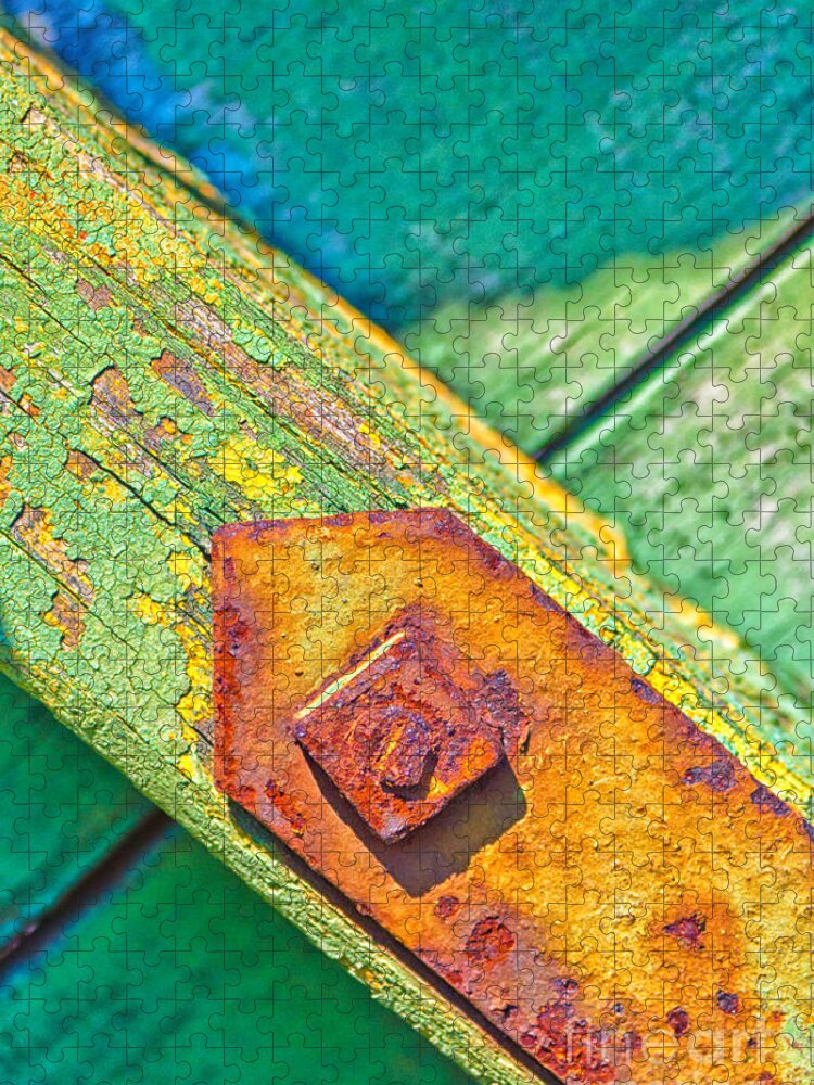 Abstract Jigsaw Puzzle featuring the photograph Rusty bolt on rotten green wood by Silvia Ganora