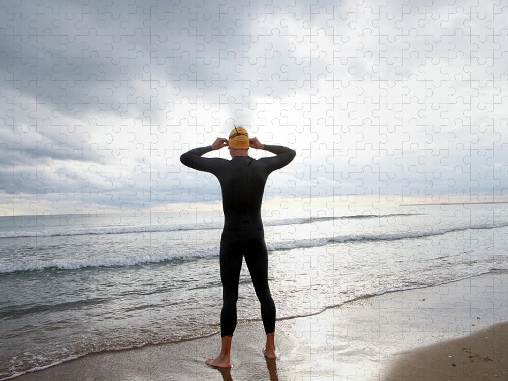 Hands Behind Head Puzzle featuring the photograph Swimmer On The Beach by (c) Jaime Monfort