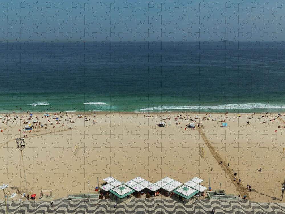 Copacabana Jigsaw Puzzle featuring the photograph The Beach Of Copacabana.rio De Janeiro by Buena Vista Images