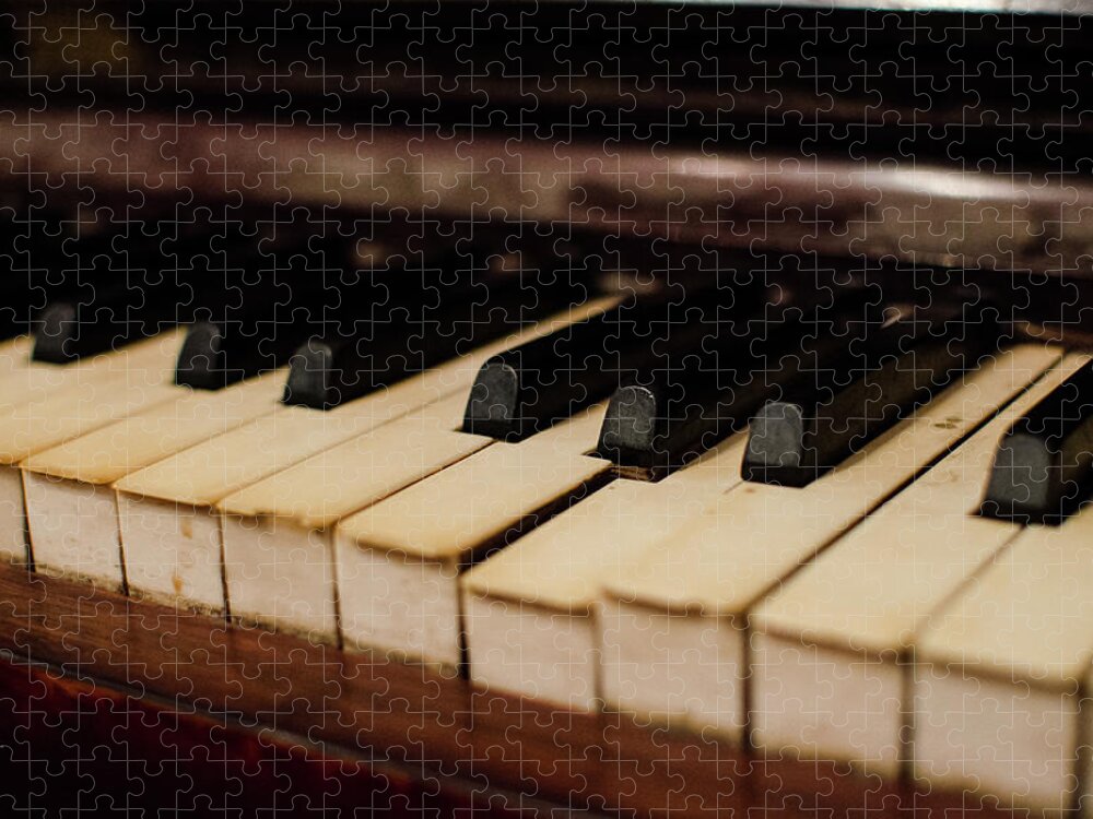 Piano Jigsaw Puzzle featuring the photograph Timeworn Piano Keys by Megan Ahrens
