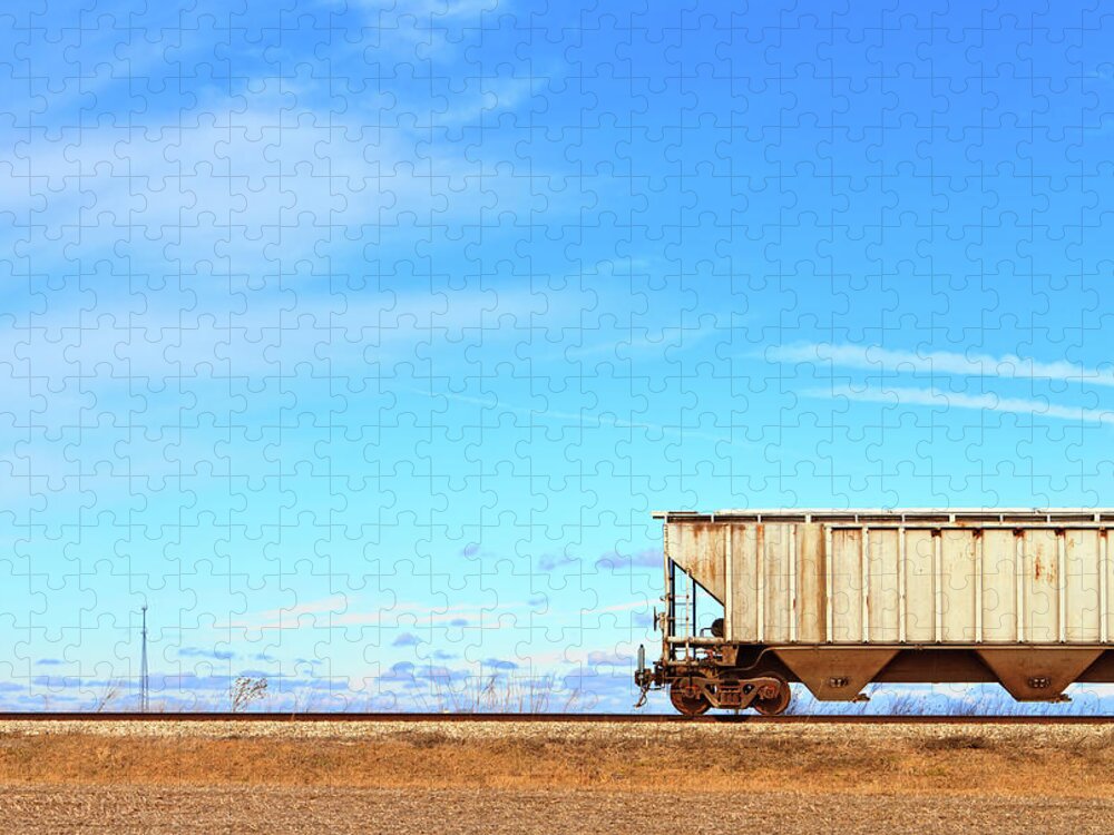 Train Jigsaw Puzzle featuring the photograph Train Car On Railroad Tracks by Ghornephoto