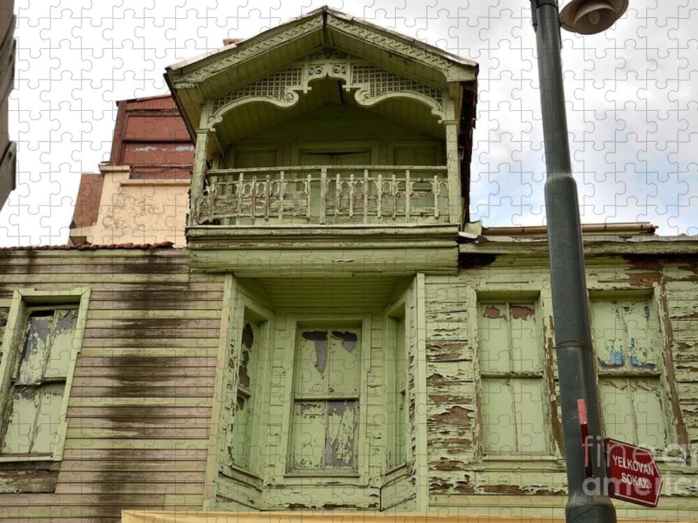 House Jigsaw Puzzle featuring the photograph Weathered old green wooden house by Imran Ahmed