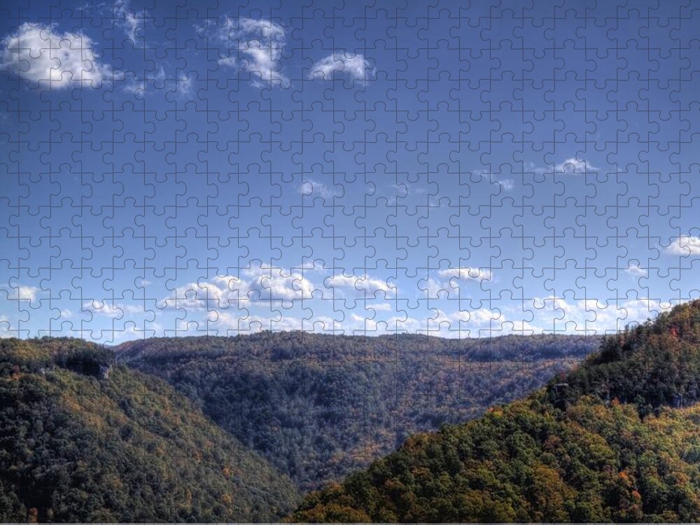 River Jigsaw Puzzle featuring the photograph Wide shot of tree covered hills by Jonny D