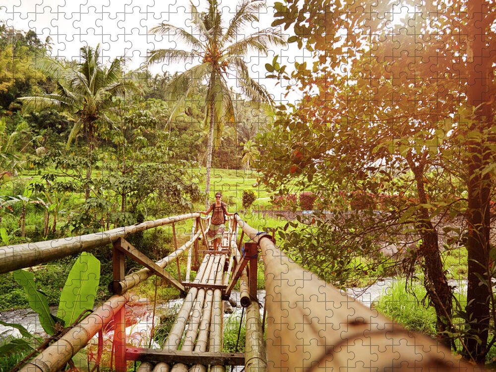 Scenics Jigsaw Puzzle featuring the photograph Woman Walking Over A Bamboo Bridge by Poncho