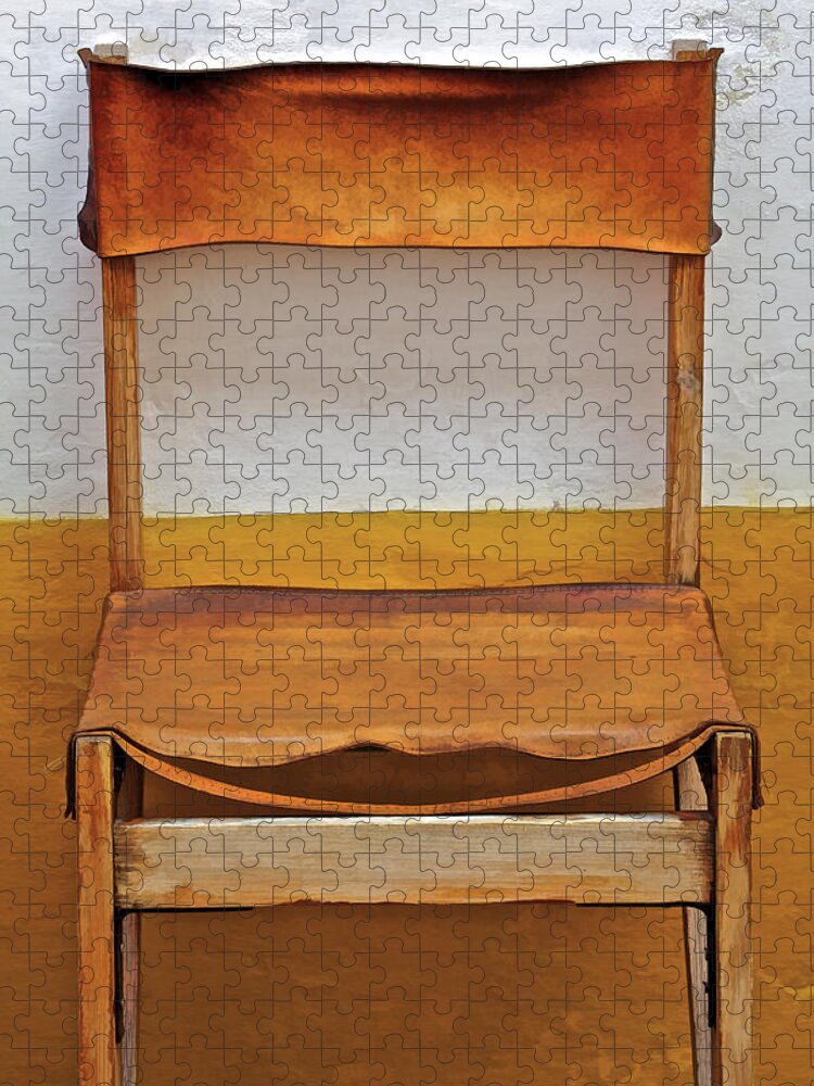 Artistic Jigsaw Puzzle featuring the photograph Worn Leather Outdoor Cafe Chair by David Letts