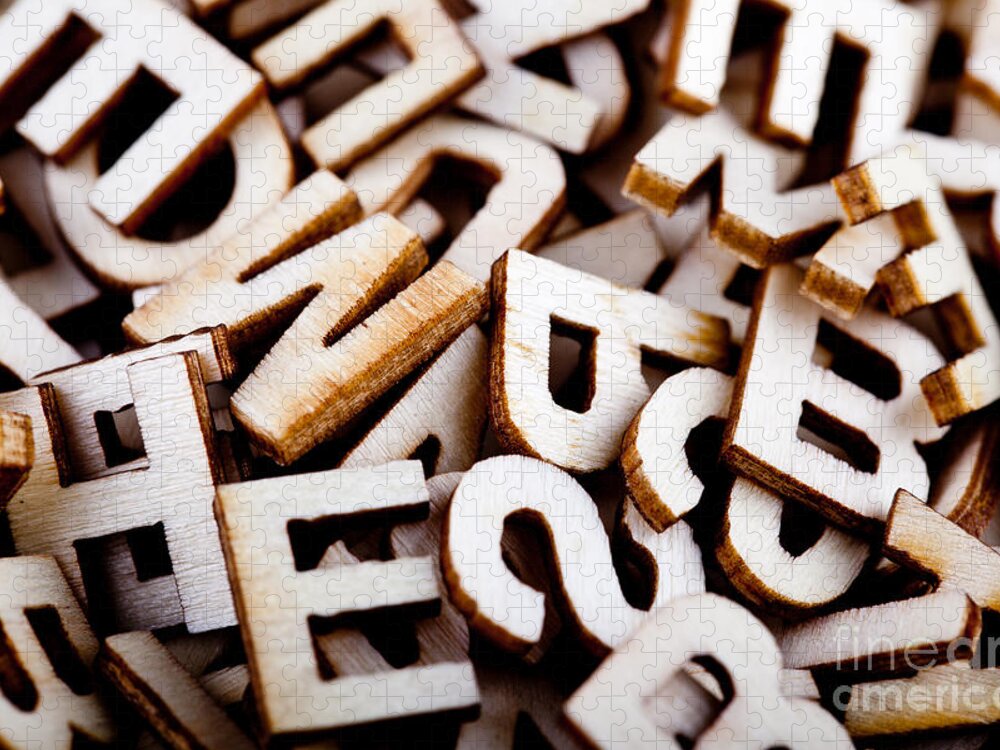 Letters Jigsaw Puzzle featuring the photograph Jumbled letters close up by Simon Bratt