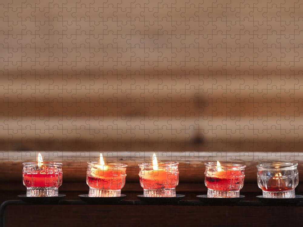 Candles Jigsaw Puzzle featuring the photograph Prayer candles in church by Matthias Hauser