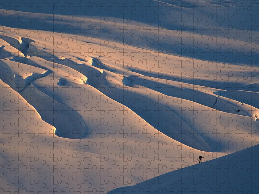 00260037 Jigsaw Puzzle featuring the photograph Skier And Crevasse Patterns At Sunset by Colin Monteath