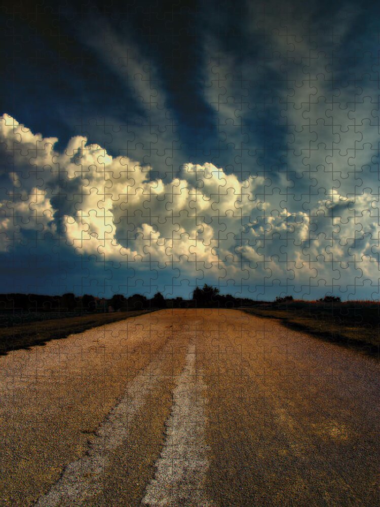 White Clouds Jigsaw Puzzle featuring the photograph Something Wicked Ahead by Bill and Linda Tiepelman