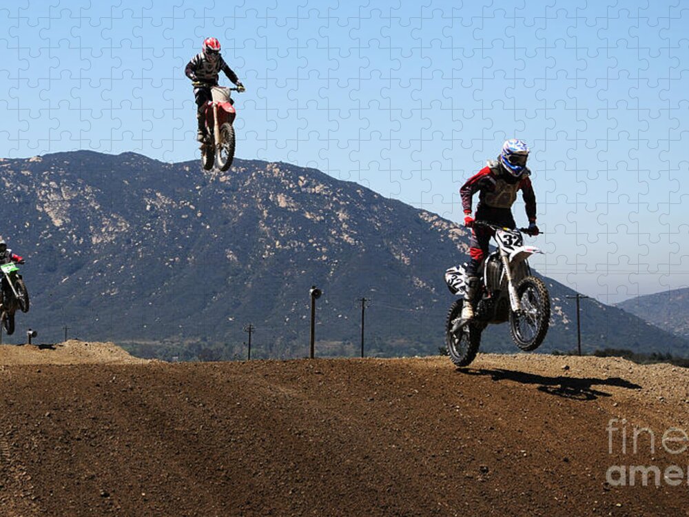 Motocross Jigsaw Puzzle featuring the photograph Three in the Air by Vivian Christopher