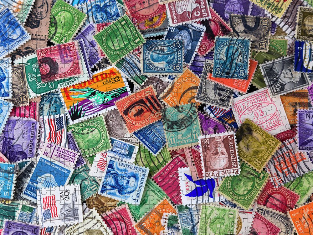 Stamp Collecting Jigsaw Puzzle featuring the photograph A Collection of used US Postage Stamps off paper by Jack R Perry