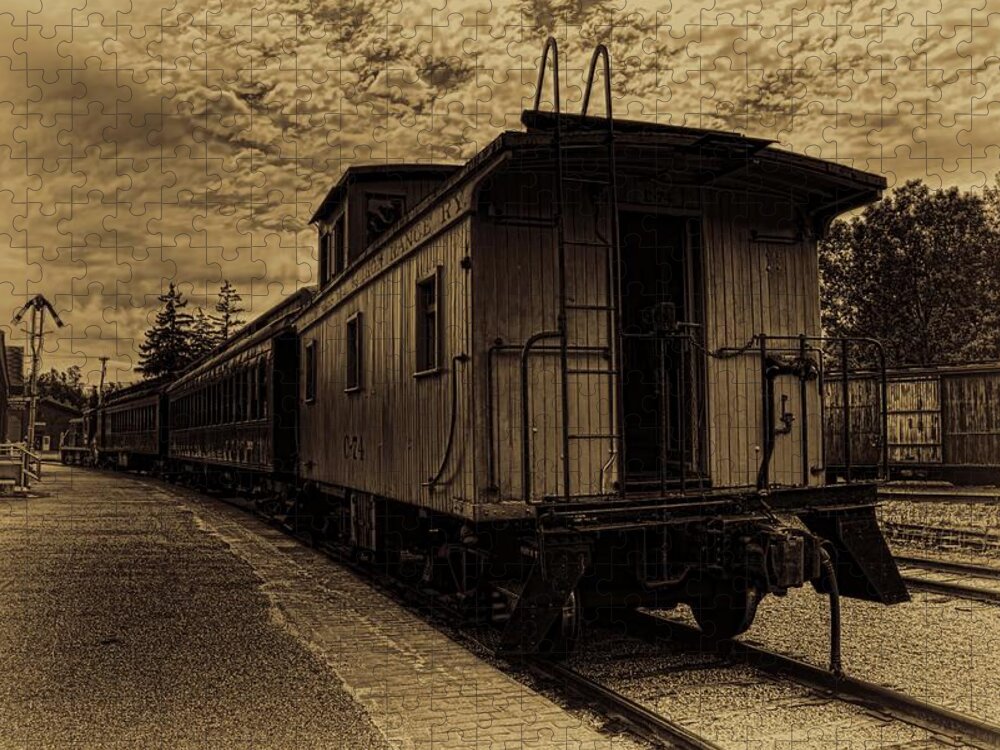 Sepia Jigsaw Puzzle featuring the photograph Antique Iron Range Caboose by Dale Kauzlaric