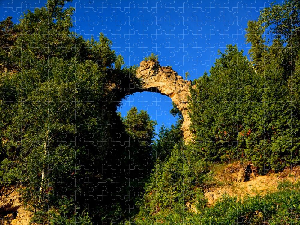 Mackinac Island Jigsaw Puzzle featuring the photograph Beneath Arch Rock by Keith Stokes