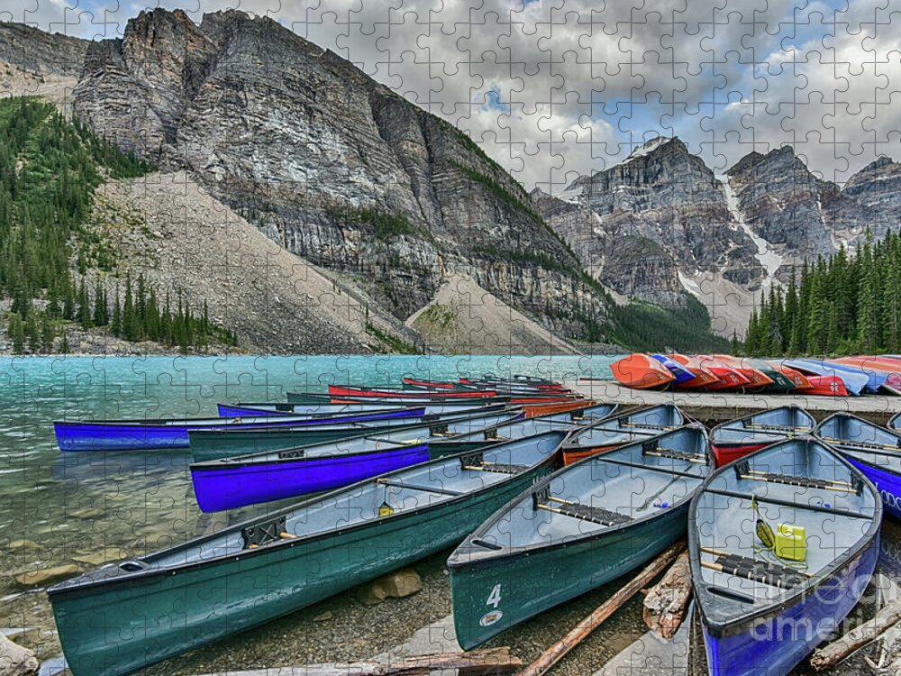 Moraine Lake Jigsaw Puzzle featuring the photograph Canoes on Moraine Lake by Paul Quinn