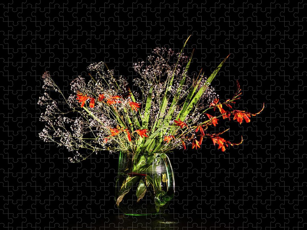 Baby's Breath Jigsaw Puzzle featuring the photograph Cascade of white and orange. by Torbjorn Swenelius