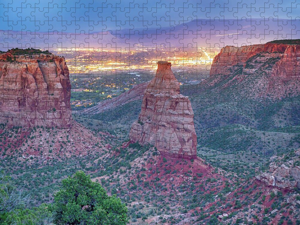 Monument Jigsaw Puzzle featuring the photograph Colorado National Monument Park And City Lights by James BO Insogna